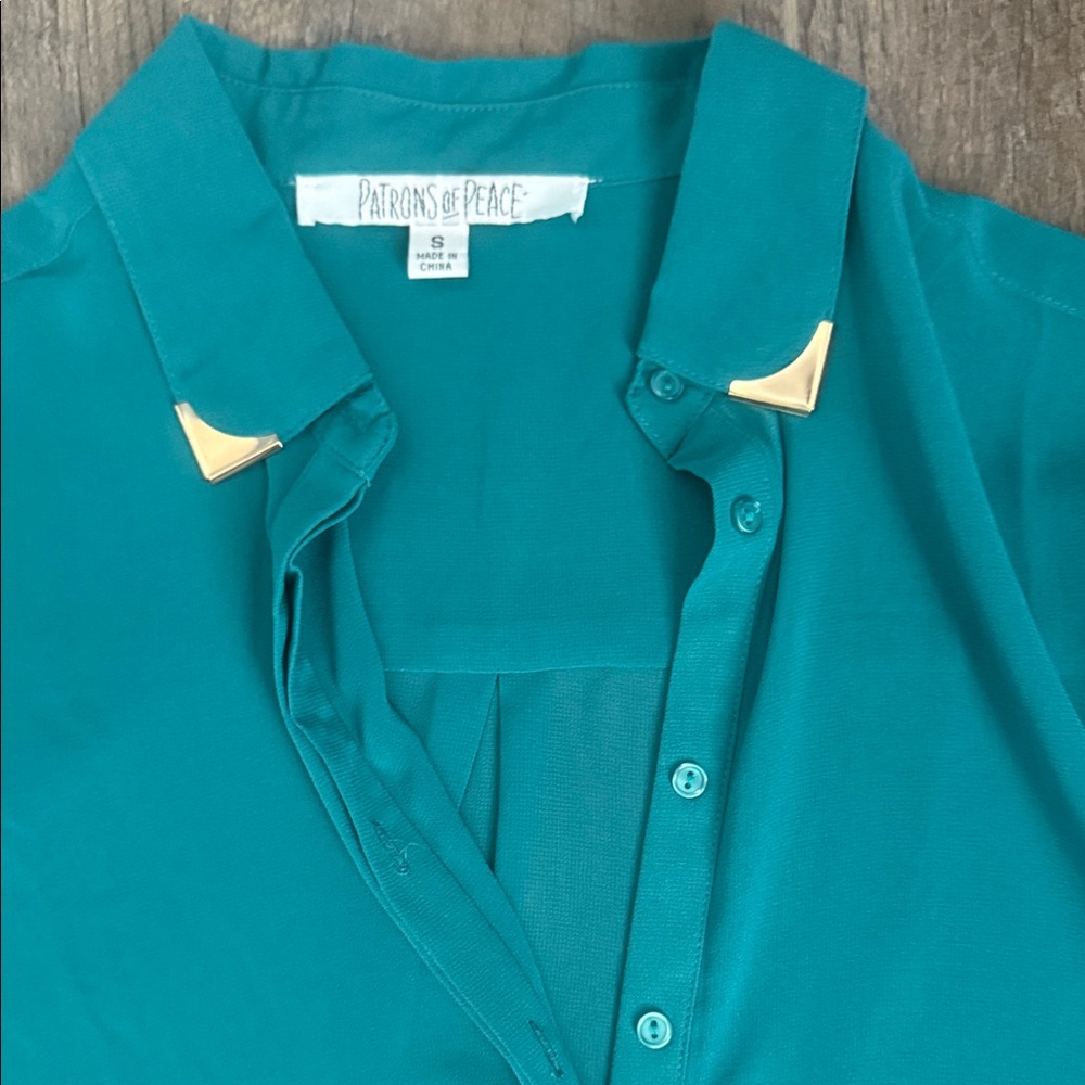 Patrons of Peace Turquoise Shirt with Gold Details
